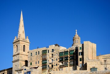 Fototapeta na wymiar View of St Pauls Anglican Cathedral and the Basilica of Our Lady of Mount Carmel, Valletta, Malta.