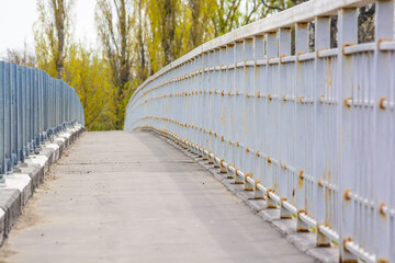 Old narrow metal bridge