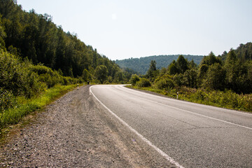 Road in mountain and trees around