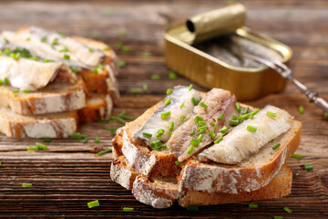 fresh sandwich with sardines on wholegrain bread - 157365154