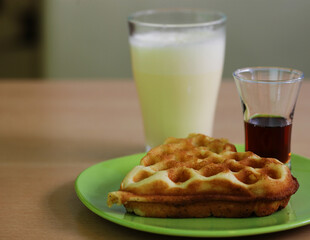 Delicious waffle with milk