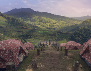 Obraz premium camping area and misty around the forest at chiangmai thailand