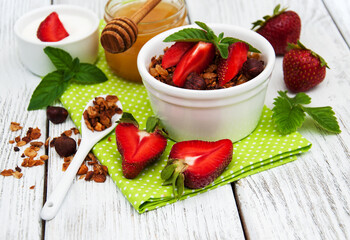Homemade granola with strawberries