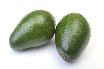 Fresh, green Avocado isolated on a white background.