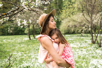 Mum with small daughter in her arms