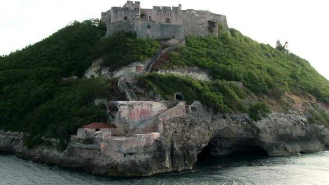 View from a ship as the camera tracks San Pedro de la Roca Castle near Santiago de Cuba. Taken at dawn