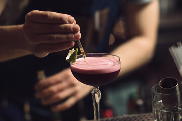 Add flavor enhancer in a cocktail