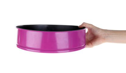 Woman holding baking form for cooking classes on white background