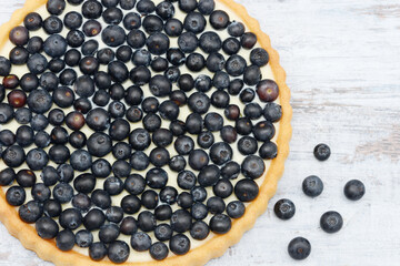 blueberry fruit cake on wood