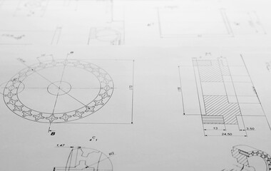 Part blueprints as background. Engineering concept