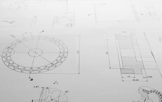 Part blueprints as background. Engineering concept