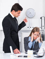 Businessman feeling angry to coworker