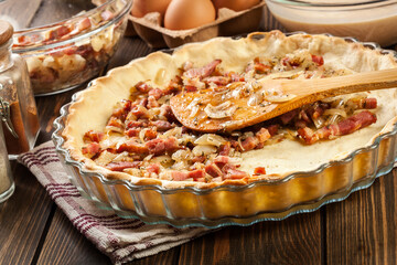 Making stuffing while preparing a traditional quiche