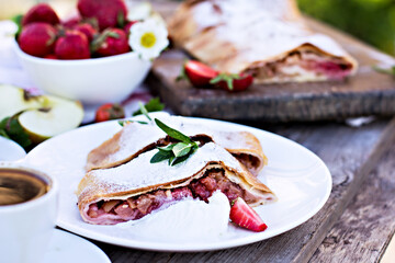 Strudel with apples and strawberries.