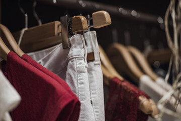 Fancy clothing on racks in a store in Paris.