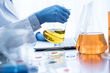 Researchers are investigating the yellow liquid that entered the flask
