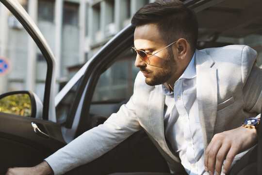 Driver Entering In His Car