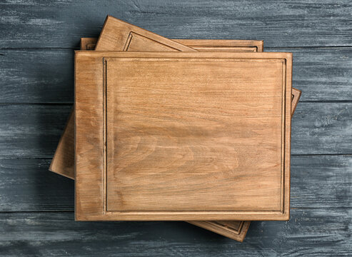 Stack of wooden boards on table