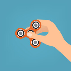 Obraz premium Human hand with Hand spinner, Fidget Spinner toy for increased focus on blue background. Vector illustration.
