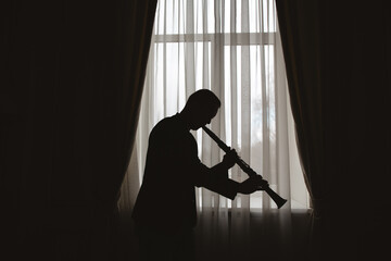 Man silhouette with clarinet
