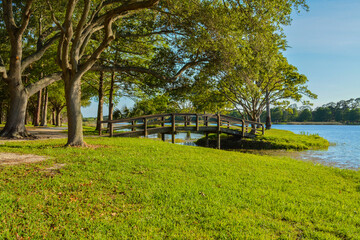 A beautiful day for a walk and the view of the wood bridge to the island at John S. Taylor Park in Largo, Florida.