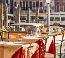 Venice touristic restaurant table on Grand Canal.