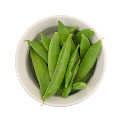 Top view of sugar snap peas in a small bowl isolated on a white background.