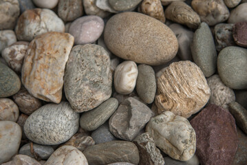 Fototapeta na wymiar river stones pattern close