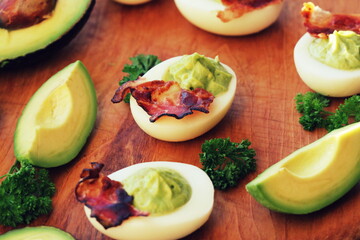 Breakfast - deviled eggs with avocado and crisp ham