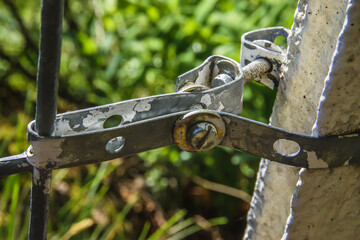 old fence screw connection closeup