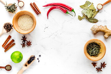 Dry colorful spices, chili pepper on kitchen stone table background top view mockup
