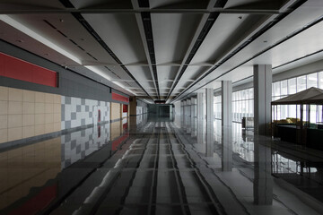 Grey foyer and floor reflection.
