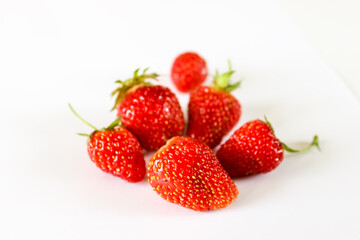 Fototapeta na wymiar Sweet and juicy Strawberries on a white background