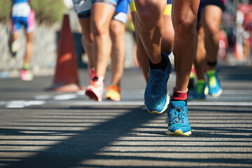 Marathon running race, people feet on city road - obrazy, fototapety, plakaty
