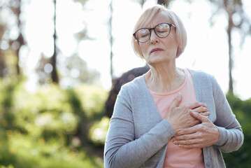 Overwhelmed pensioner having heart attack outdoors
