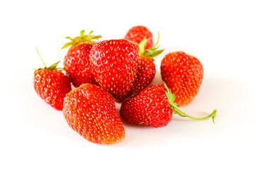 A close-up of a large strawberries on a white background