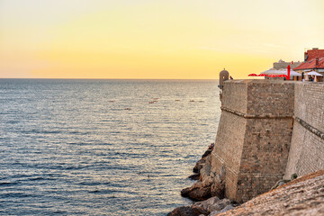 Fototapeta na wymiar Sunset at Adriatic sea and Dubrovnik fort