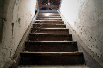 Fototapeta na wymiar Old stairs to the attic