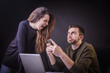 Husband and wife fighting over money and expenses, loudly and passionately