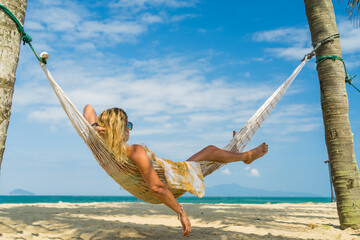 Woman relaxing at the beach