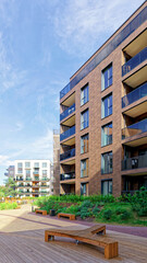 Benches at Modern architectural complex of apartment residential buildings