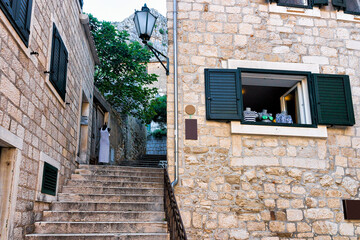 Street with stairs at old city center in Omis