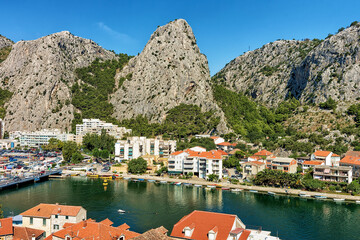 Omis town among hills and Cetina River