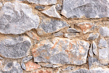 Natural stone wall made of stone texture for interior design