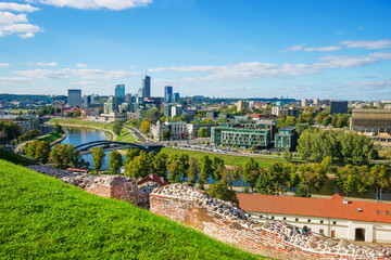 Wall ruins and Financial district with skyscrapers in Vilnius