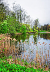 Fototapeta na wymiar Small pond in Traku Voke public park in Vilnius