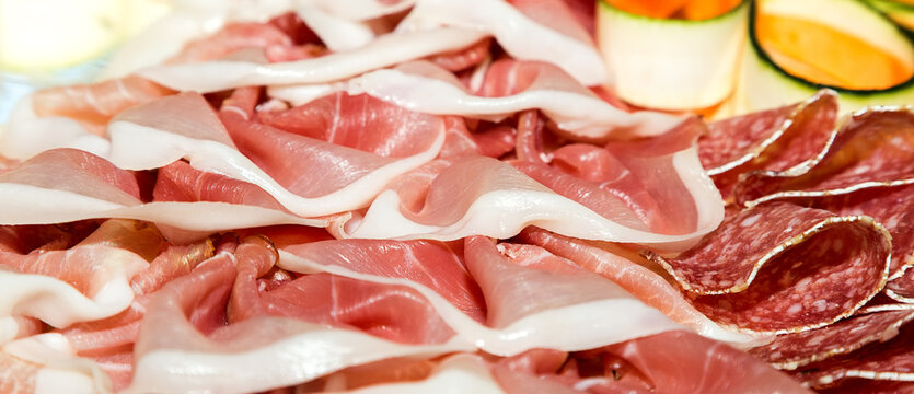 Salami with ham cut into strips