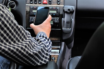 An image of car and mobile phone