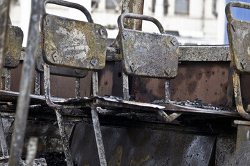 Burnt tram inside - burned seats are in a row
