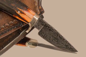 The fine details in the pattern of the Damascus steel show the skill of the smith